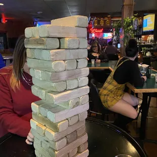 a tall stack of bricks on a table