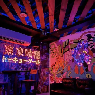 a bar with neon signs