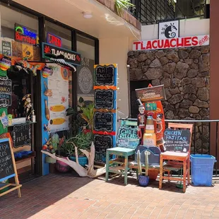 a storefront with a variety of items