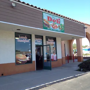 Storefront w/new sign.