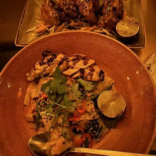 SPICY CHILI GARLIC HO FUN NOODLES (GF,V) with added chicken and the crispy shrimp (behind)