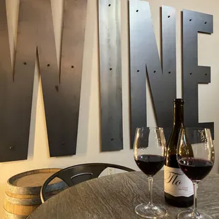 two glasses of wine on a table