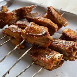 skewered meat on a plate