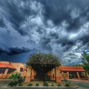 Peppi's House Main Entrance. Monsoon season clouds.