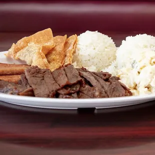 Hawaiian restaurant serving loco moco, Spam musubi, Ahi Poke bowl, Kalua pig, Lomi salmon, Lau lau, kalua cabbage and hawaiian shave ice.