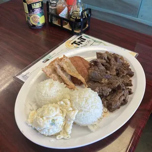 Hawaiian restaurant serving loco moco, Spam musubi, Ahi Poke bowl, Kalua pig, Lomi salmon, Lau lau, kalua cabbage and hawaiian shave ice.