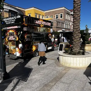 a food truck parked in front of a building