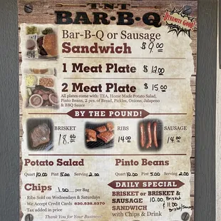 a menu for a sandwich and meat plate