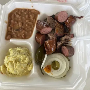 Brisket and sausage potato salad and beans.