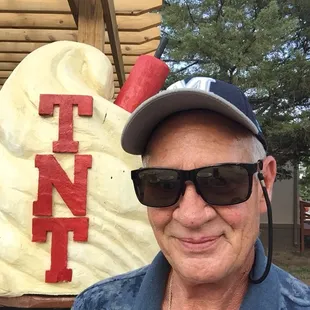 a man wearing sunglasses and a hat