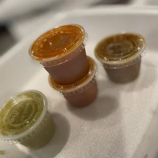 three condiments on a tray