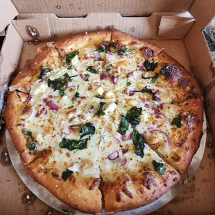 Chicken and Spinach Pizza. Hints of garlic too.