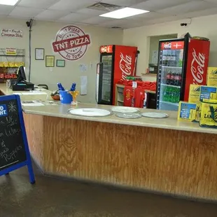 a counter and a chalk board