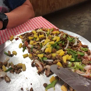 a half eaten pizza on a table