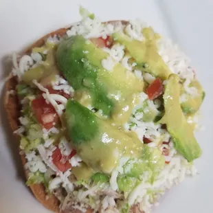 Tostadas are so good. I like how the meat is shredded and the veggies are finely chopped. It makes it easy to eat.