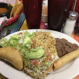 #30 Mexican cravings plate. Flauta, Mexican quesadilla &amp; sope, rice &amp; beans
