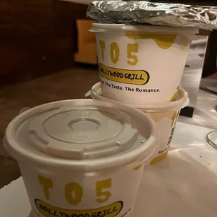 two cups of food on a table