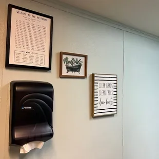 a wall mounted paper towel dispenser