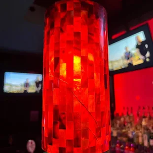 a red lamp hanging from the ceiling