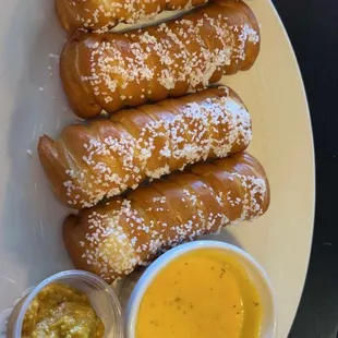 Pretzel Bites. Nice &amp; salty with choice of a hearty mustard or cheese dip. Excellent with a ice cold brew.