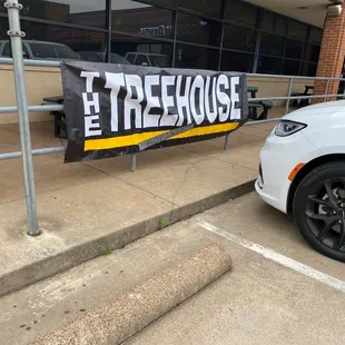 a car parked in front of a restaurant