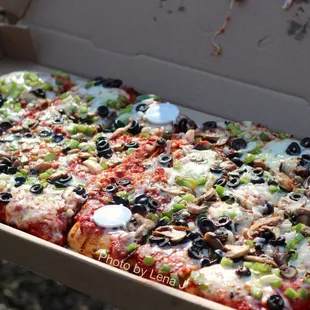 Detroit Style Deep Dish Veggie Pizza ($32.99) - pizza sauce, Mozzarella Cheese, Mushrooms, Black Olives, Green Peppers and Onions