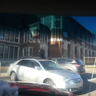 Building and fenced parking lot