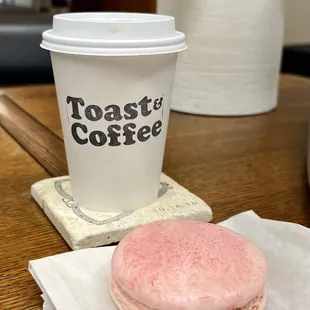 Pour-over coffee and a rosé macron