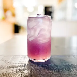 a pink drink in a glass