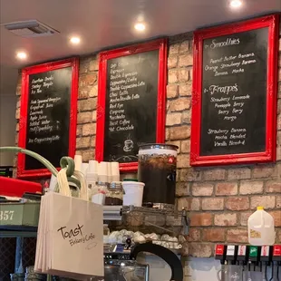 menus on a brick wall