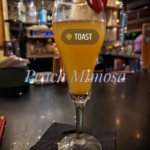 a glass of beer on a table