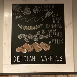 a chalkboard with a menu for belgian waffles