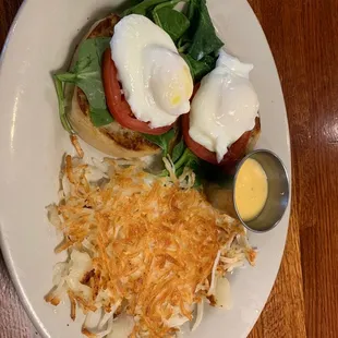 Benny eggs with holly sauce on the side