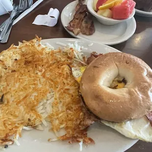 Bacon egg and cheese on a bagel .