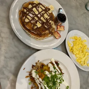 Nutella Madness Pancakes with Bananas, Hash Brown Hill, scrambled, 1 Egg Any Style