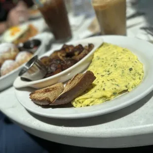 Herb omelette and side of potatoes