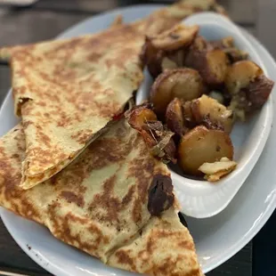 Mushroom, Onion, Spinach, and Gruyere crepe.