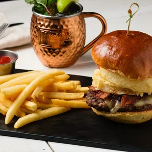 Western Burger-1/2 lb grass fed beef, hardwood smoked bacon, white cheddar, beer battered onion rings, bourbon BBQ sauce, and a brioche bun.