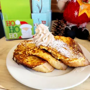 Holiday Special Eggnog French Toast with brown sugar cinnamon whipped cream.