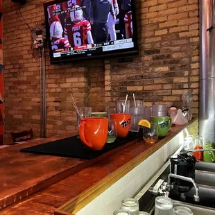 a bar with a flat screen tv