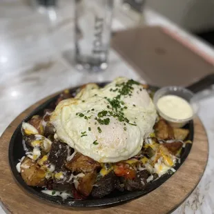 Beef short rib breakfast skillet you can have a choice of how you want your eggs made!