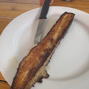 A slap of crispy pork belly