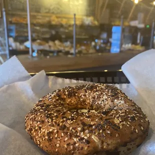 Everything bagel scooped bagel with plain cream cheese