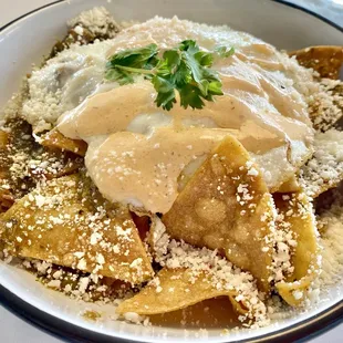 Chilaquiles. Good, but careful with the verde sauce. It gets too spicy if you try to eat it all.