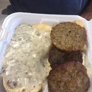 Breakfast platter with biscuits &amp; gravy and sausage