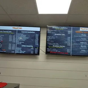 menus on the wall of a restaurant
