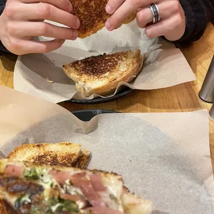 a person eating a sandwich