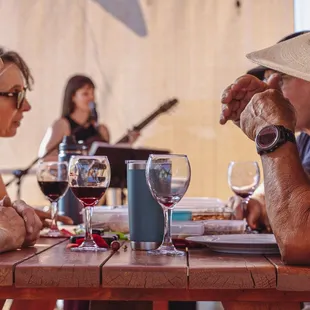 Rachelle singing live music at Sierra Peaks Winery for a club member event.