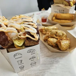 Shrimp Egg Drop sandwich with pot stickers and egg rolls