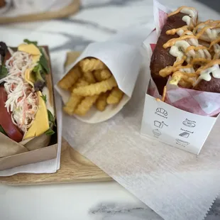 two hot dogs and french fries